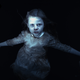 A ghostly girl falls backwards in this scene from Martyrs Lane.